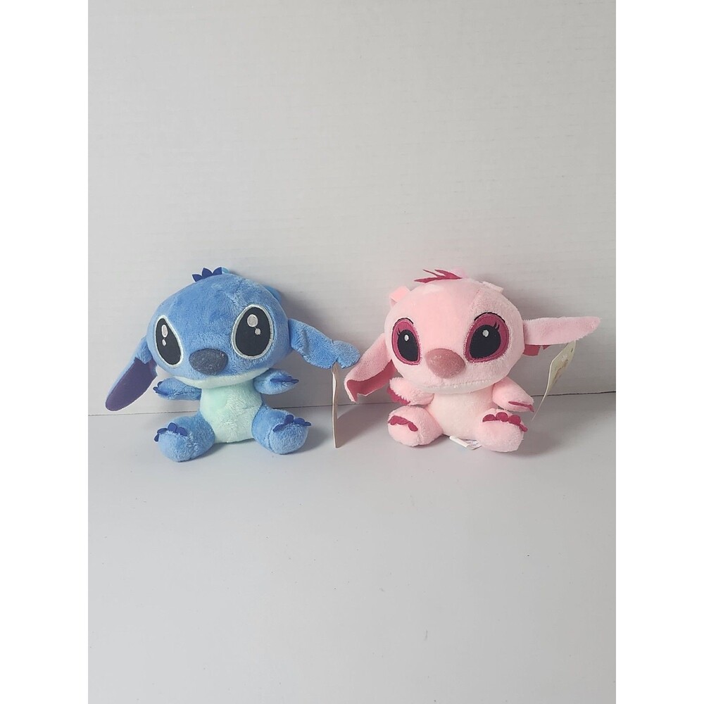 Lot Of 2 Bag Charms Lilo And Stitch And Angel